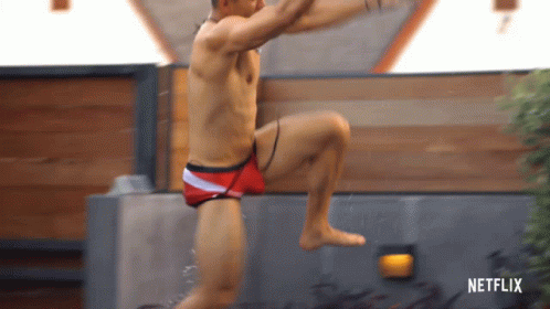 Cannonball Jump Man In Red Shorts GIF