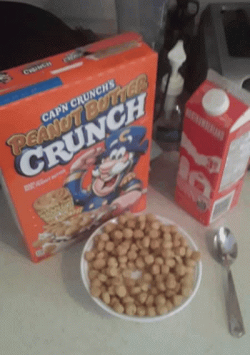 Capn Crunch Peanut Butter Crunch Next To Bowl Of Cereal GIF