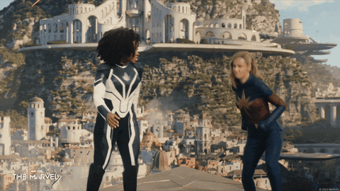 Captain Marvel Running From Attack GIF