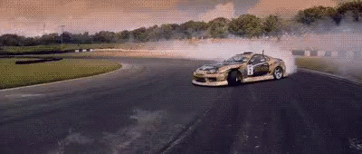 Car Drifting on Track With Smoke