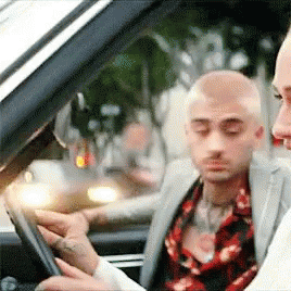 Car Driving Woman And Man Looking Back GIF