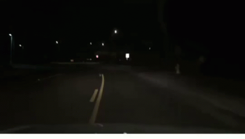 Car Driving At Night Headlights On GIF
