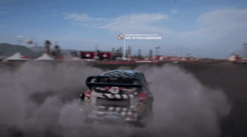 Car Driving Down Dirt Road Race Of The Year Sign GIF