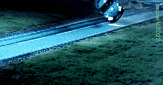 Car Driving Down Road 2023