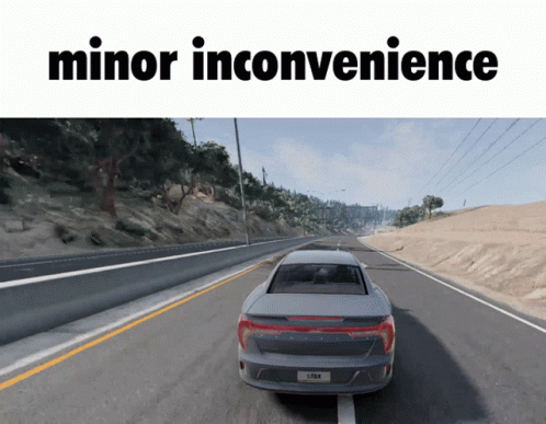 Car Driving Down Road Saying Minor Inconvenience