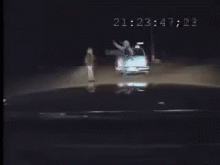 Car Driving Down Street at Night 2123 51 21