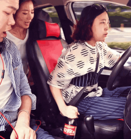 Car Driving Gear With Soft Drink Bottle GIF