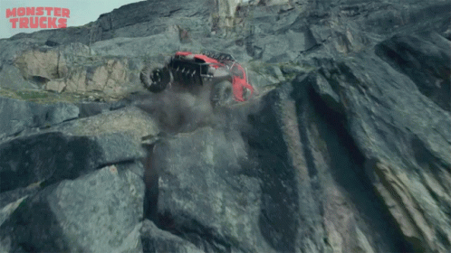 Car Driving Off Cliff Monster Trucks GIF