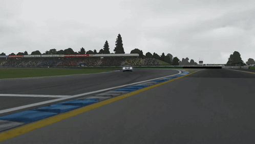 Car Driving on Race Track With Mercedes Benz Sign