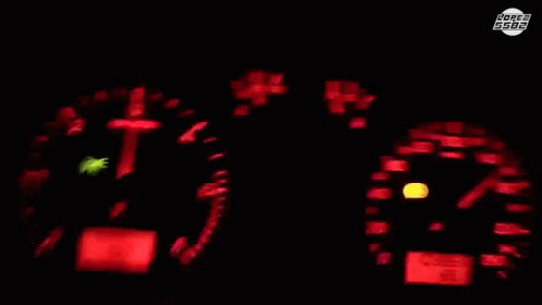 Car Driving on Street with Houses and Roger 5588 Sign