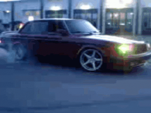 Car Driving With Smoking Tires
