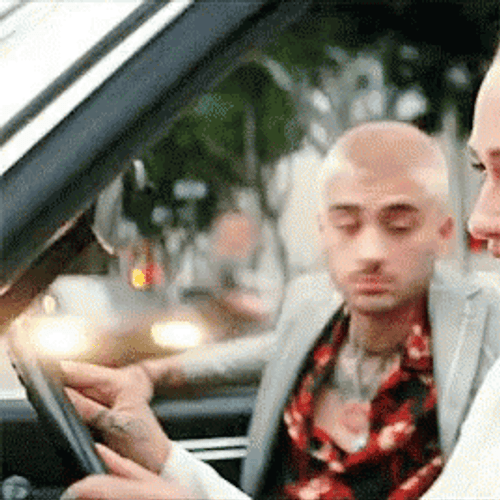 Car Driving Woman And Man Looking Back GIF