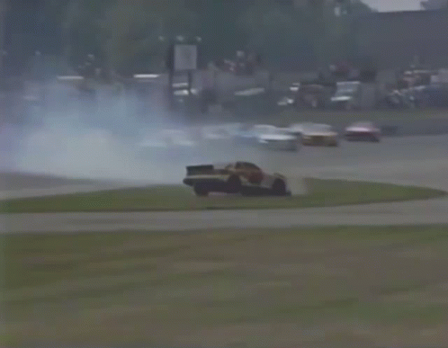 Car Flying Through Air on Race Track