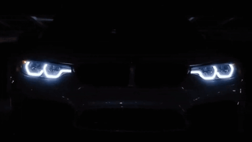 Car Headlights Lit Up Close Up