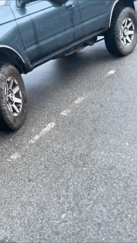 Car with Flat Tire Parked