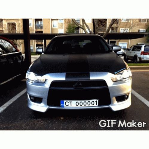 Car With License Plate CT 000001 Parked