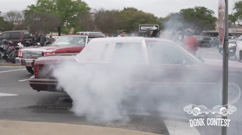 Car With Smoke And Donk Contest Sign