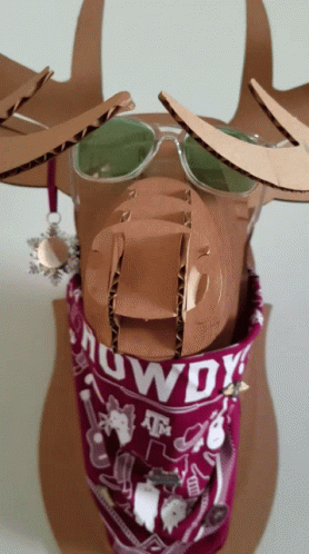 Cardboard Reindeer Wearing Sunglasses and Bandana Saying Rowdy