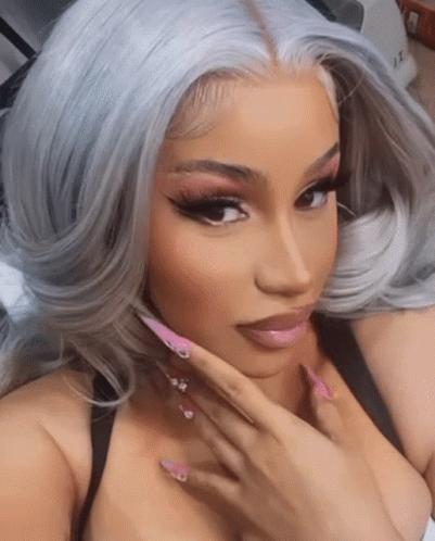 Cardi B Awkward Stare GIF
