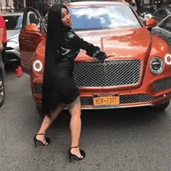 Cardi B Flexing Bentley GIF