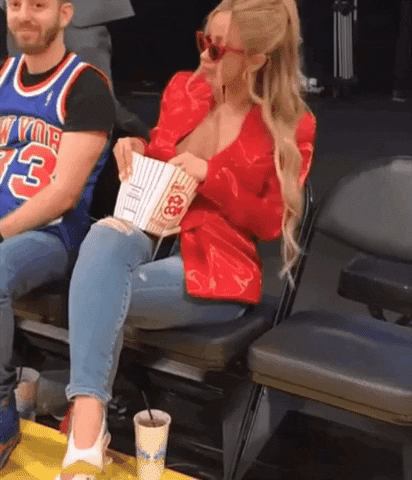 Cardi B. Grooving While Chewing Popcorn Meme GIF