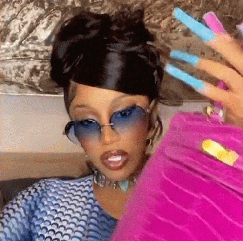 Cardi B Holding Bag GIF