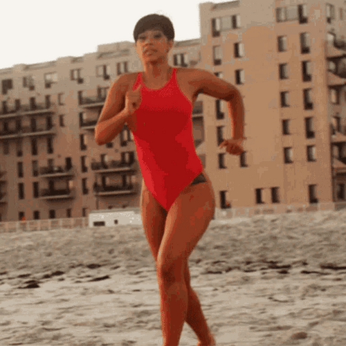 Cardi B Running In Beach GIF