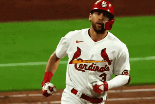 Cardinals Player Running to Home Plate
