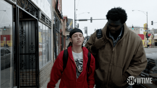 Carl Gallagher Talking To Big Guy Walking GIF