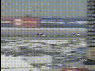 Cars Driving Down Road GIF