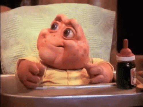 Cartoon Baby in High Chair Next to Medicine Bottle