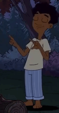Cartoon Boy Standing in Front of Tree