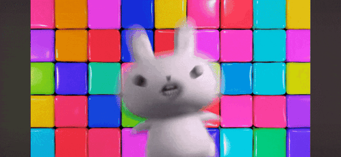 Cartoon Bunny Standing in Front of Colorful Squares