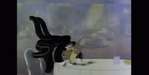 Cartoon Cat Sitting at Table With Beer