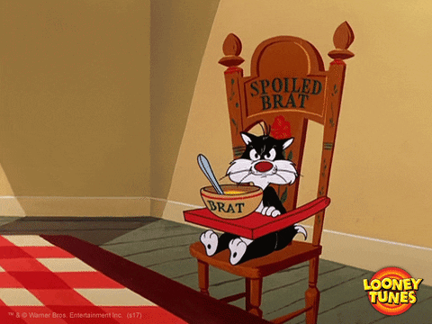 Cartoon Cat Sitting in High Chair With Bowl of Brat
