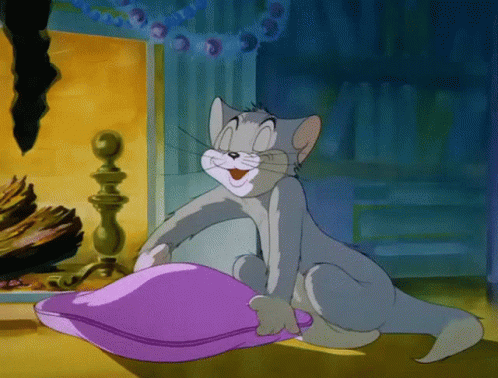 Cartoon Cat Smiling Holding Purple Pillow