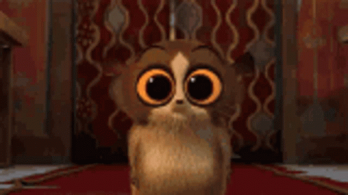 Cartoon Cat with Big Orange Eyes
