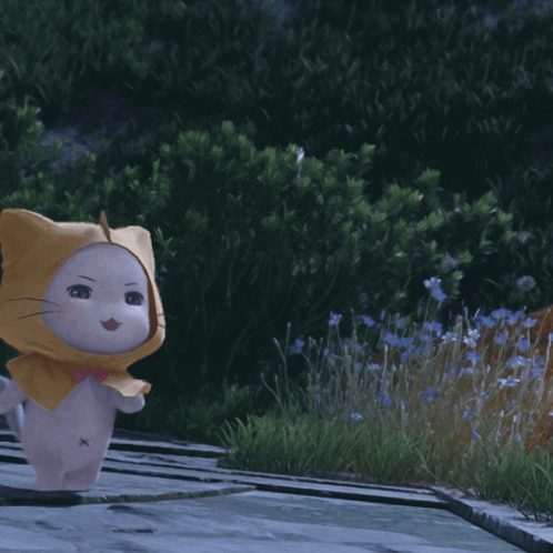 Cartoon Cat with Yellow Hood and Pink Bow