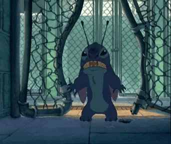 Cartoon Character Chained to Chain Link Fence