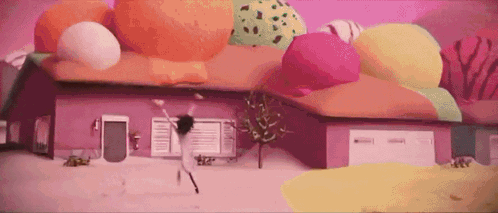 Cartoon Character Dancing in Front of Pink Ice Cream House