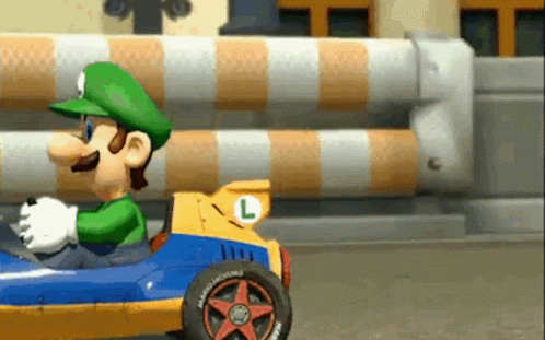 Cartoon Character Driving Race Car GIF