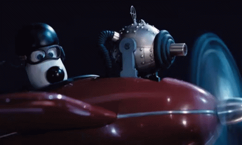 Cartoon Character Driving Red Vehicle GIF