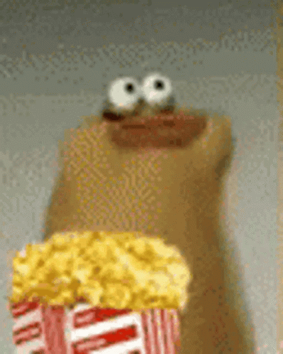 Cartoon Character Holding Popcorn and Donut