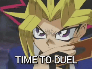 Cartoon Character Holding Time To Duel Card GIF