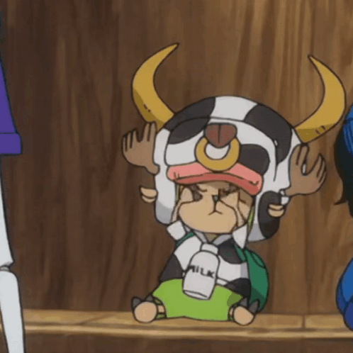 Cartoon Character In Cow Hat Holding Milk Bottle GIF