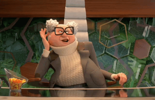 Cartoon Character in Glasses and Turtleneck Sitting