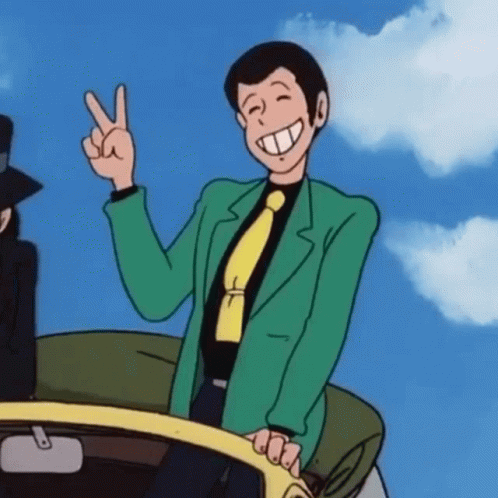 Cartoon Character In Green Suit Giving Peace Sign GIF