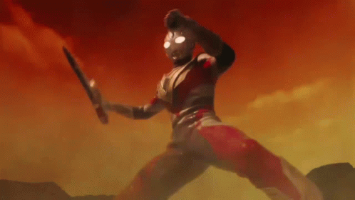 Cartoon Character In Red And Silver Holding Bat GIF
