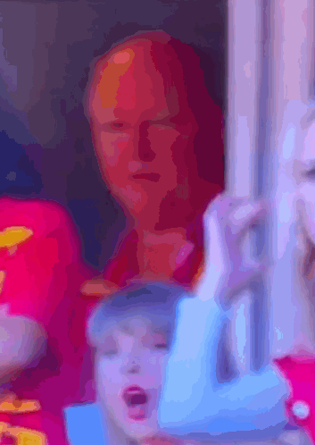 Cartoon Character in Red Sweatshirt With KS Logo