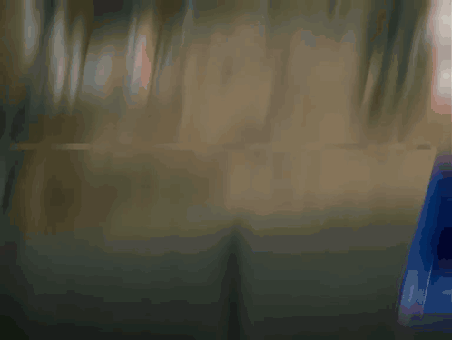 Cartoon Character In Suit Adjusting Tie GIF